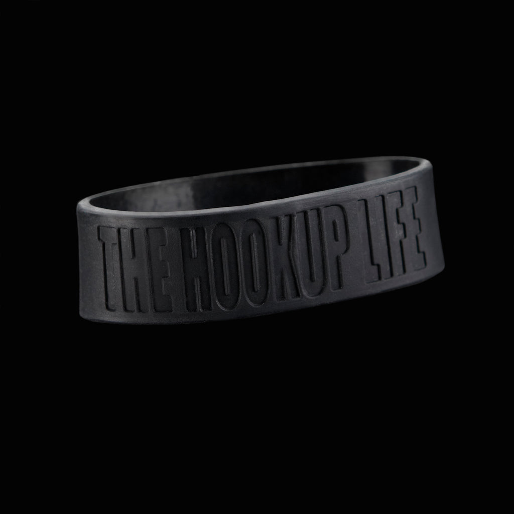 The Hookup Life OG Spirit Linx wristband — first‑generation founder‑era band representing the origin of the Hookup Life movement, cultural identity, and the earliest teachings of the Spirit Linx lineage.