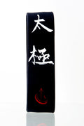 Tai Chi Intentional Band by Spirit Linx — a 1‑inch black wristband symbolizing flow, oneness, and the harmony between mind, body, and energy.